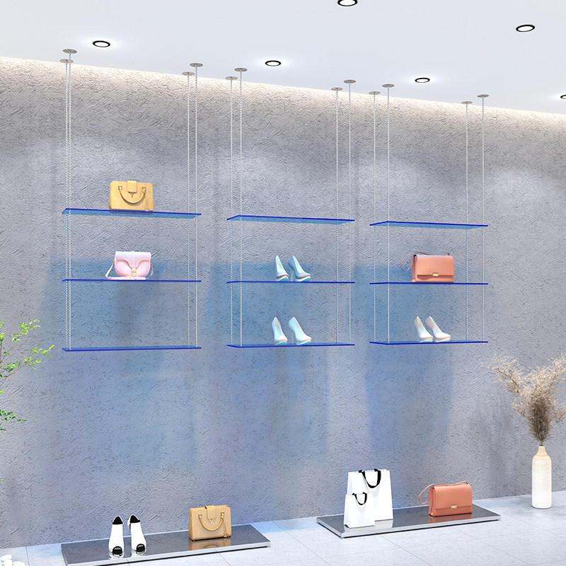 Luxury Bags In Store - Clothing store window display rack hanging